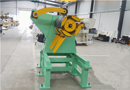A Decoiler machine with pressure arm for coil handling processing