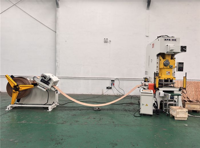 How a Turnkey Stamping Line Makes Perfect Discs: A Look at Decoiler, Straightener, Servo Feeder & Press